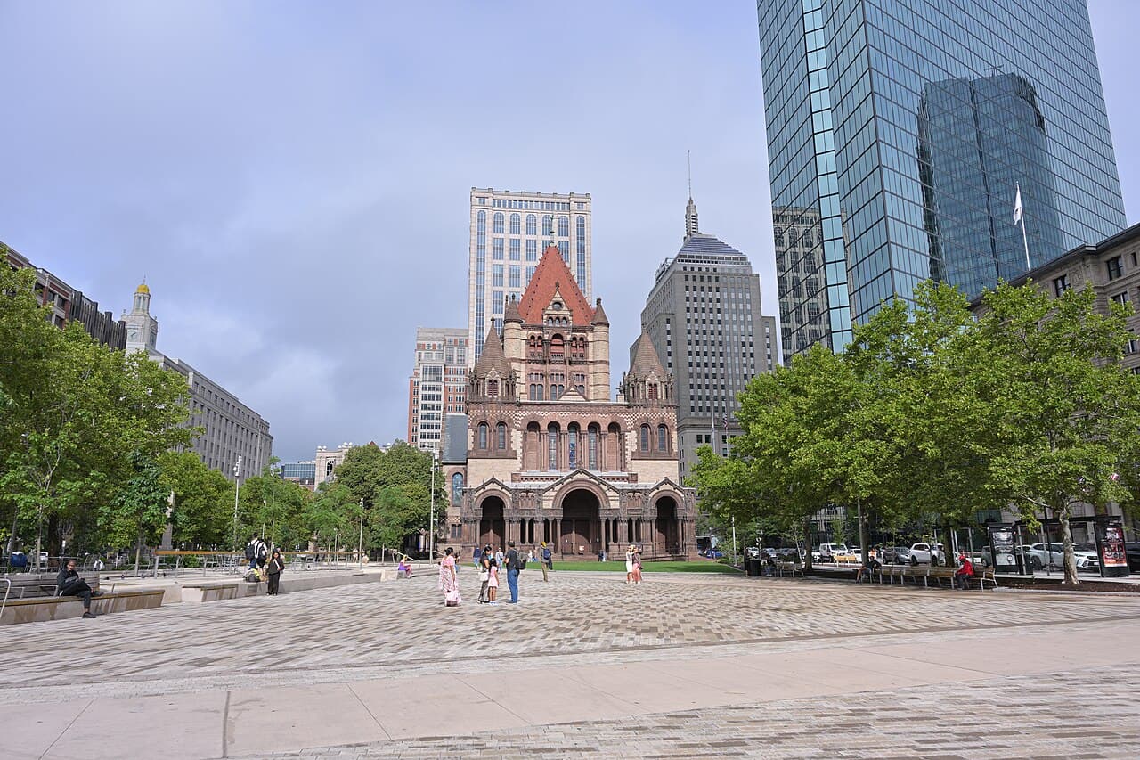 The open plaza of Copley Square in Back Bay, looking east to Trinity Church with office towers behind it
